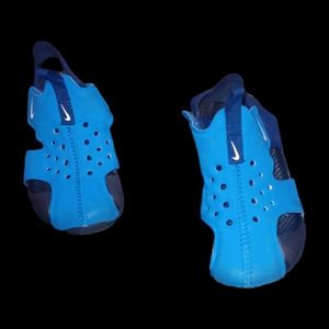 A pair of 9C kids Nike swimming shoes